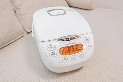 a scale sitting on top of a couch at Sheath Okachimachi Apartment Hotel in Tokyo