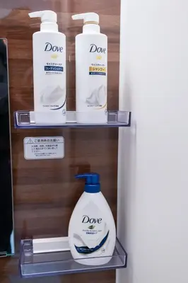a shelf with two bottles of deodorizers on it at \u98a8\u82b1Fuka\u6c11\u6cca\u5927\u68ee\u672c\u753a in Tokyo