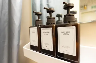 a row of bottles of soap on a shelf at \u30d9\u30eb\u30a8\u30a2\u5927\u4e45\u4fdd205 in Tokyo