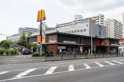 a mcdonalds restaurant on the side of a city street at shinjuku-ookubo Apartment room201 in Tokyo