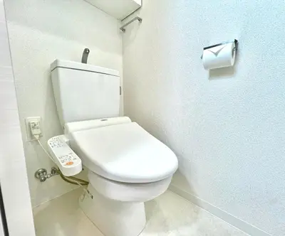 a bathroom with a white toilet with a remote control at Shinjuku City Apt, 2DB , Free WiFi in Tokyo