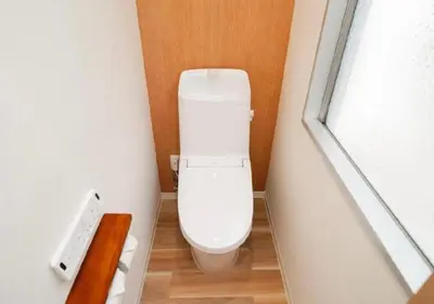 a bathroom with a white toilet in a room at Oshiage SAIEI Hotel 402 in Tokyo