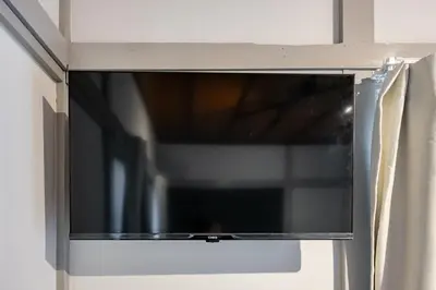 a microwave door with a window in a kitchen at AkebonoHouse201 in Tokyo