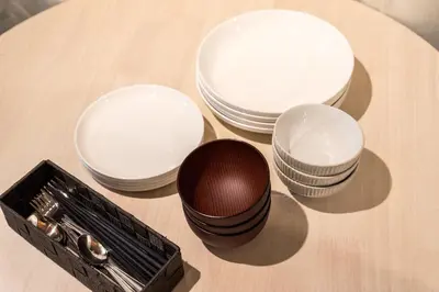 a group of bowls and a box on a table at AkebonoHouse201 in Tokyo