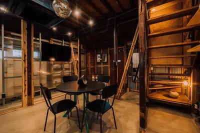 a dining room with a table and chairs at Ivy Harajuku in Tokyo