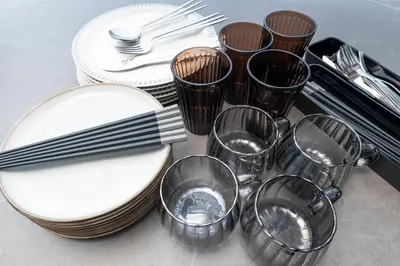a tray with plates and utensils on a table at Hanna Inn Shinbashi Onarimon in Tokyo