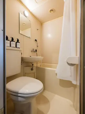a bathroom with a toilet and a sink at Better Than Outside 12 min Shibuya by train in Tokyo