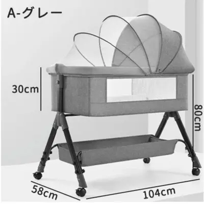 a baby crib in grey in a room at Second Home SHINJUKU in Tokyo