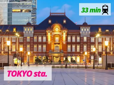 a large building with a sign that reads tokyo sta at LAGOON Suite OHANA in Tokyo