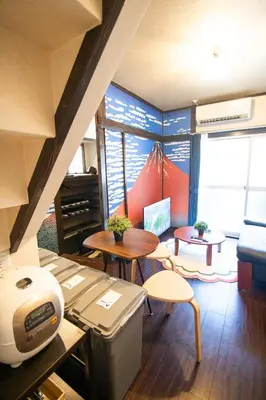 a room with a table and a desk and a table and a table at Omori Tei\u5927\u68ee\u4eadOMT 18min to Haneda, 3min Omori, Max 7 people in Tokyo