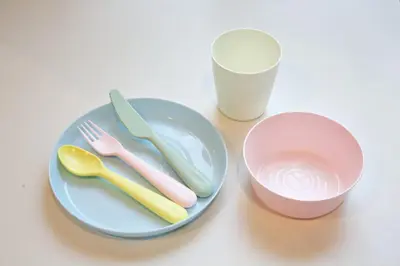 a plate with a fork and knife and a cup at Heureux\u690e\u540d\u753a 303 in Tokyo
