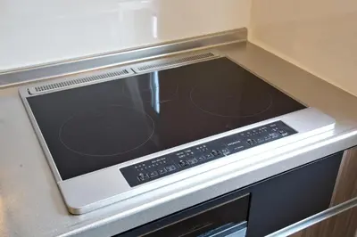 a stove top oven in a kitchen at Heureux\u690e\u540d\u753a 303 in Tokyo