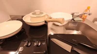 a kitchen with a sink and a stove and a sink at \u3089\u3057\u3063\u304f\u3059\u6c60\u888b204 in Tokyo