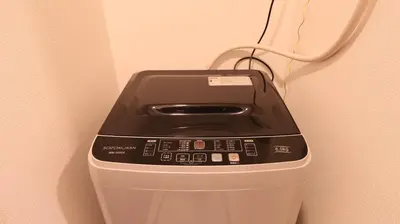 a fax machine is plugged into a wall at \u3089\u3057\u3063\u304f\u3059\u6c60\u888b204 in Tokyo
