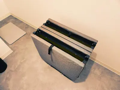 a briefcase sitting on the floor next to a wall at The Hotel REPOS SUMIDA1 in Tokyo