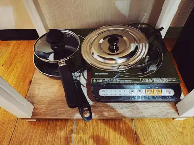 a slow cooker sitting on top of a table at The Hotel REPOS SUMIDA2 in Tokyo