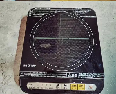 a close up of a toaster oven on a table at The Hotel REPOS SUMIDA2 in Tokyo