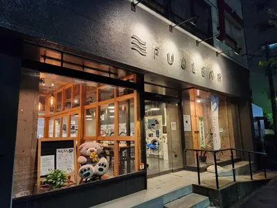a store front with a teddy bear in the window at The Hotel REPOS SUMIDA2 in Tokyo