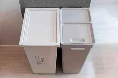 two trash cans are sitting next to each other at Shinjuku SAIEI Hotel 402 in Tokyo