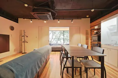 a kitchen and dining room with a table and chairs at Steps from Shibuya Crossing B in Tokyo