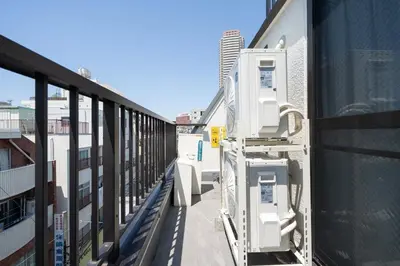 a view from a balcony of a building with machines at \u767d\u7802\u30d3\u30eb in Tokyo