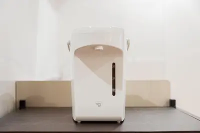 a white appliance sitting on top of a table at Shinjuku SAIEI Horizon Hotel in Tokyo