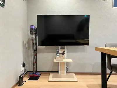 a large flat screen tv sitting on a wall at nestay villa tokyo nippori in Tokyo