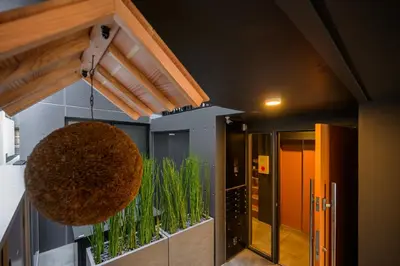 a room with a large orb hanging from the ceiling at Camo's Tokyo Oshiage in Tokyo