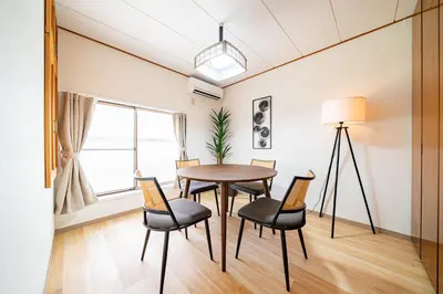 a dining room with a table and chairs at #36 -\u5e02\u8c37\u52a0\u8cc0\u753a- Entire House in Tokyo