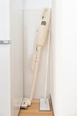 a white hair dryer in a corner of a room at #36 -\u5e02\u8c37\u52a0\u8cc0\u753a- Entire House in Tokyo