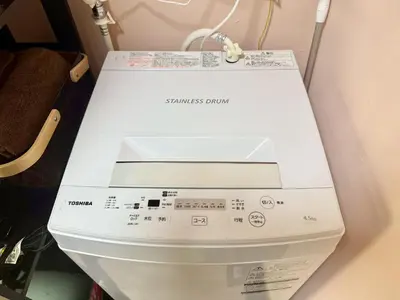 a toilet with a box on top of it at Tokyo Stay Ikebukuro East in Tokyo