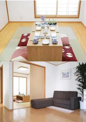 a living room with a table and a couch at Joy \u62bc\u4e0a\u4e00\u6237\u5efa in Tokyo