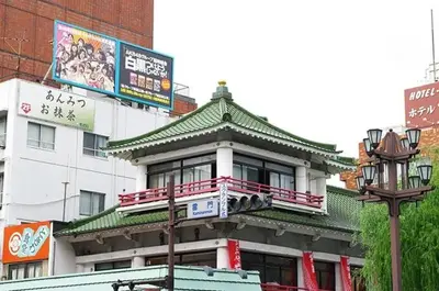 a building with an asian roof on a city street at Wonderful stay TOKYO KURAMAE in Tokyo