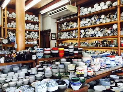 a store filled with lots of plates and bowls at Wonderful stay TOKYO KURAMAE in Tokyo