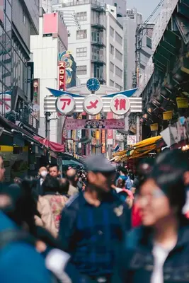 a crowd of people walking down a busy city street at Wonderful stay TOKYO KURAMAE in Tokyo