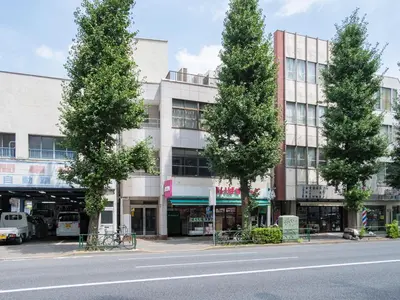 a group of trees in front of a building at Dormitory \u30b5\u30fc\u30af\u30eb\u30c6\u30f3- Share Room For Male Only \u7537\u6027\u5c02\u7528\u30c9\u30df\u30c8\u30ea\u30fc in Tokyo