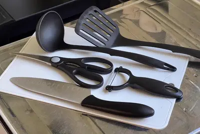 a group of scissors sitting on top of a table at -Room MtFuji- Max 9 people 8 minutes to Shibuya 5 minutes to Shinjuku 1 minute to Harajuku 4 minutes walk from the station in Tokyo