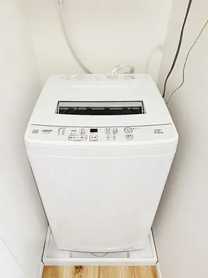 a washing machine sitting on a shelf in a room at Tokyo Stay Itabashi House in Tokyo