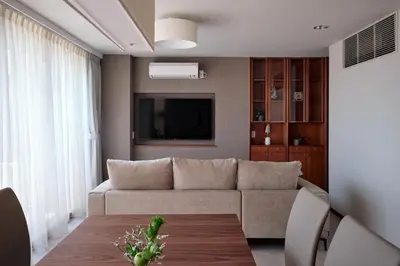 a living room with a couch and a tv at Noël Shibuya Once -Luxury Residence in Tokyo