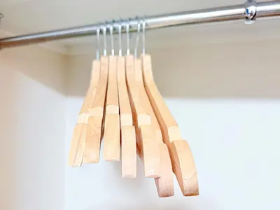 a bunch of wooden utensils hanging from a rack at \u6c60\u888b\u672c\u753a303 in Tokyo