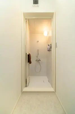 a bathroom with a walk in shower in a room at \u30a2\u30f3\u30c9\u30b9\u30c6\u30a4\u5800\u52076\u4e01\u76ee in Tokyo