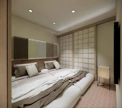 a large white bed in a room with a mirror at Minshuku 203 under the clear sky 8-minute walk from Kinshicho Station direct line to Narita Airport 50-minute walk from Disneyland and 1-minute walk from the mall in Tokyo
