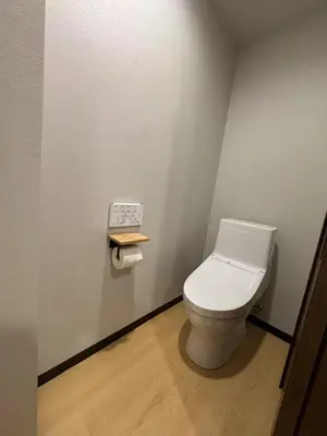 a bathroom with a white toilet in a room at Minshuku 203 under the clear sky 8-minute walk from Kinshicho Station direct line to Narita Airport 50-minute walk from Disneyland and 1-minute walk from the mall in Tokyo