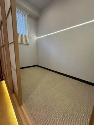 an empty room with a door and a window at Minshuku 203 under the clear sky 8-minute walk from Kinshicho Station direct line to Narita Airport 50-minute walk from Disneyland and 1-minute walk from the mall in Tokyo