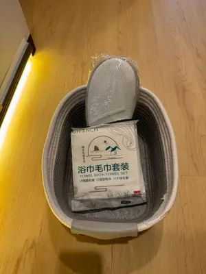 a mortar and pestle in a basket on a wooden floor at Clear Sky Guesthouse 205 Direct to Narita Airport, 8-minute walk from Kinshicho Station, within walking distance of Asakusa and Clear Sky Tower, 50 minutes to Disneyland, 1 minute to the mall in Tokyo