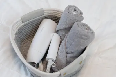 a bag with some items in it at Clear Sky Guesthouse 305 Direct to Narita Airport, 8-minute walk from Kinshicho Station, within walking distance of Asakusa and Clear Sky Tower, 50 minutes to Disneyland, 1 minute to the mall in Tokyo