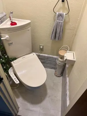 a bathroom with a toilet and a sink at NEW OPEN Available for 10 people 1 line to airport in Tokyo