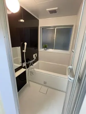 a bathroom with a bath tub and a window at NEW OPEN Available for 10 people 1 line to airport in Tokyo