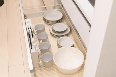 a bunch of plates and dishes in a pantry at \u5922\u306e\u5bbf \u6771\u4e2d\u91ce 134t in Tokyo