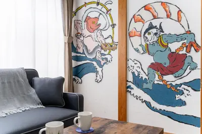 a living room with a chair and a stained glass window at Sushi Art Hotel at Kamiisshiki\u5bff\u53f8\u30a2\u30fc\u30c8\u30db\u30c6\u30ebat\u4e0a\u4e00\u8272 in Tokyo